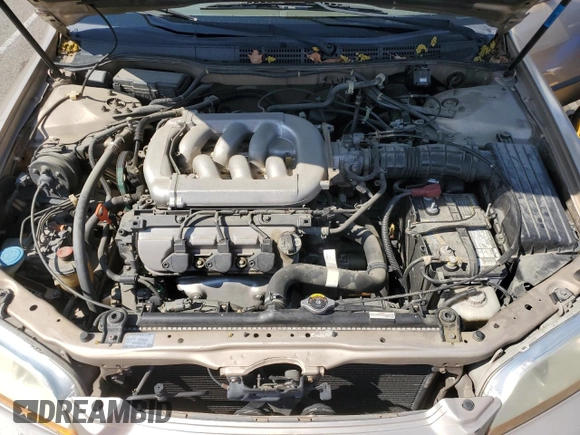 2000 Honda Accord LX z VIN 1HGCG1643YA089899, wystawiony jako Copart lot #54937555 z przebiegiem 196 596 mil mil oraz Szkoda całkowita • Salvage title. Historia ofert i sprzedaży dostępna na DreamBid. Obrazek 11.
