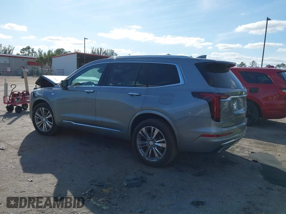 2023 Cadillac XT6 AWD Premium Luxury with VIN 1GYKPDRS0PZ158595, listed as a IAAI auction lot 41051122 with 39,653 mi miles and . Bid and sale history available at DreamBid. Image 14.