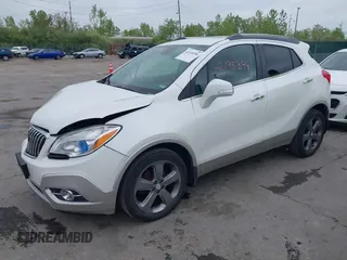 2014 Buick Encore Convenience with VIN KL4CJBSB3EB750986, listed as a IAAI auction lot 42195394 with 67,017 mi miles and . Bid and sale history available at DreamBid. Image 2.
