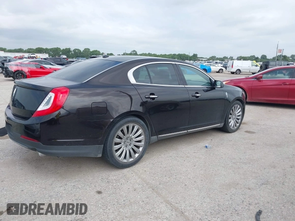 2013 Lincoln MKS with VIN 1LNHL9DK1DG608872, listed as a IAAI auction lot 42672243 with 175,935 mi miles and . Bid and sale history available at DreamBid. Image 4.