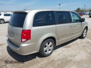 2013 Dodge Grand Caravan SE with VIN 2C4RDGBG9DR642162, listed as a IAAI auction lot 42113378 with 182,370 mi miles and . Bid and sale history available at DreamBid. Image 4.