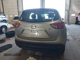 2016 Mazda CX-5 Sport with VIN JM3KE2BE5G0720507, listed as a IAAI auction lot 41872003 with 160,727 mi miles and . Bid and sale history available at carsss.com. Image 16.