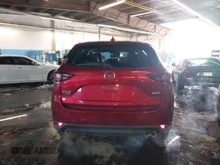 2018 Mazda CX-5 Touring with VIN JM3KFBCM7J0430425, listed as a IAAI auction lot 41524553 with 102,715 mi miles. Bid and sale history available at carsss.com. Image 15.
