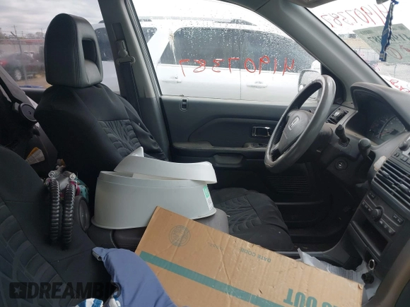 2003 Honda Pilot EX with VIN 2HKYF18523H501518, listed as a IAAI auction lot 41907387 with 234,473 mi miles and . Bid and sale history available at DreamBid. Image 5.