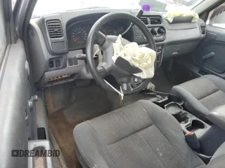2001 Nissan Frontier XE z VIN 1N6DD26S71C315501, wystawiony jako Copart lot #55604945 z przebiegiem 202 275 mil mil oraz Szkoda całkowita • Salvage title. Historia ofert i sprzedaży dostępna na DreamBid. Obrazek 8.