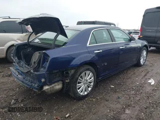 2013 Chrysler 300 Luxury Series with VIN 2C3CCASGXDH564717, listed as a IAAI auction lot 41716331 with 133,220 mi miles. Bid and sale history available at carsss.com. Image 4.