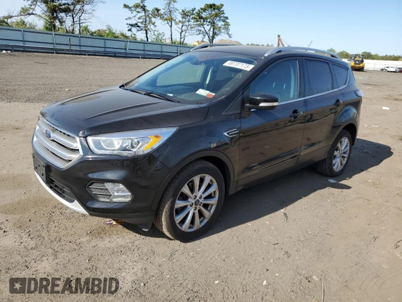 2017 Ford Escape Titanium with VIN 1FMCU9JD3HUD63223, listed as a Copart auction lot 53370004 with 128,666 mi miles and Non Repairable. Bid and sale history available at carsss.com. Image 1.