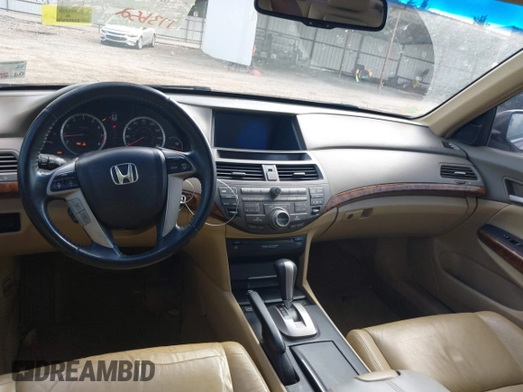 2009 Honda Accord EX-L with VIN 1HGCP36809A026761, listed as a IAAI auction lot 42163300 with 173,652 mi miles and . Bid and sale history available at DreamBid. Image 16.