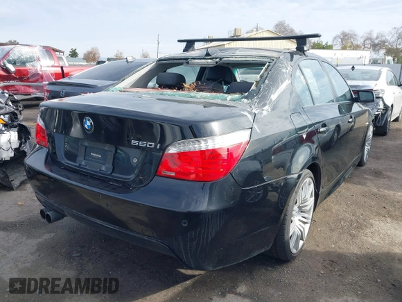 2008 BMW 5 Series 550i with VIN WBANW53508CT51457, listed as a IAAI auction lot 41103437 with 192,516 mi miles. Bid and sale history available at carsss.com. Image 4.