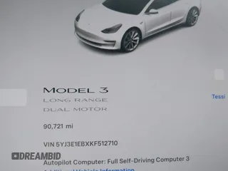 2019 Tesla Model 3 Long Range with VIN 5YJ3E1EBXKF512710, listed as a IAAI auction lot 42063737 with 90,721 mi miles and . Bid and sale history available at DreamBid. Image 7.