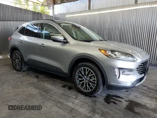 2021 Ford Escape Titanium Plug-In Hybrid z VIN 1FMCU0LZ8MUA66995, wystawiony jako Copart lot #60986765 z przebiegiem 69 609 mil mil oraz Czysty tytuł • Clean title. Historia ofert i sprzedaży dostępna na DreamBid. Obrazek 4.