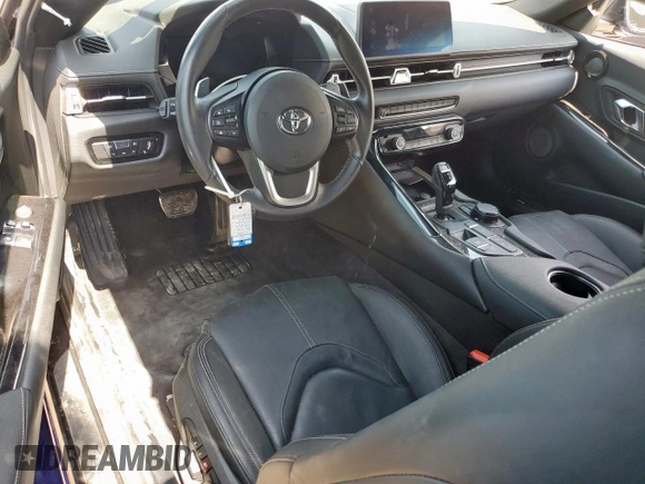 2023 Toyota Supra 3.0 with VIN WZ1DB0G05PW054758, listed as a Copart auction lot 60202015 with 32,974 mi miles and Salvage title. Bid and sale history available at DreamBid. Image 8.