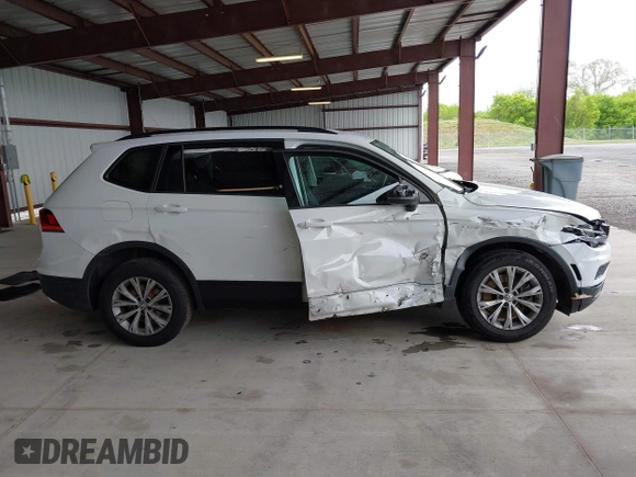 2020 Volkswagen Tiguan S z VIN 3VV1B7AX1LM110352, wystawiony jako IAAI lot #42224581 z przebiegiem 60 597 mil mil oraz . Historia ofert i sprzedaży dostępna na DreamBid. Obrazek 14.