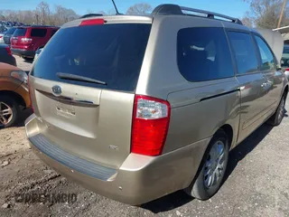 2009 Kia Sedona LX with VIN KNDMB233496278214, listed as a IAAI auction lot 41815456 with 205,799 mi miles. Bid and sale history available at carsss.com. Image 4.
