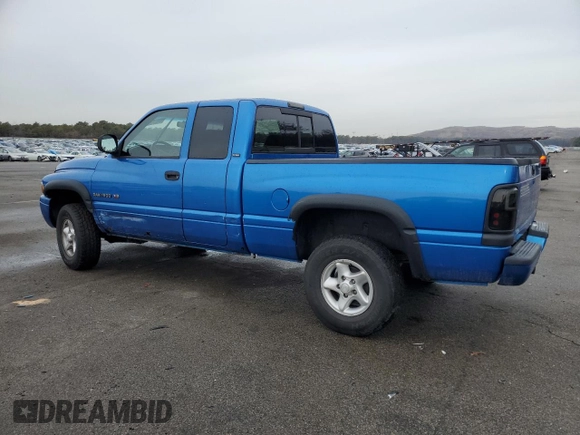 2001 Dodge 1500 with VIN 3B7HF13Y31G731107, listed as a Copart auction lot 43617755 with 143,333 mi miles and Salvage title. Bid and sale history available at DreamBid. Image 2.
