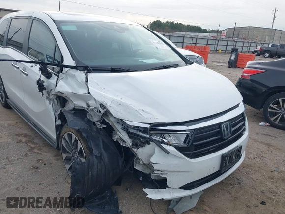 2022 Honda Odyssey EX-L with VIN 5FNRL6H7XNB047791, listed as a IAAI auction lot 41322565 with 174,498 mi miles and . Bid and sale history available at DreamBid. Image 6.