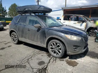 2016 Mazda CX-5 Grand Touring with VIN JM3KE4DYXG0730145, listed as a Copart auction lot 51666535 with 117,677 mi miles and Salvage Title. Bid and sale history available at carsss.com. Image 4.