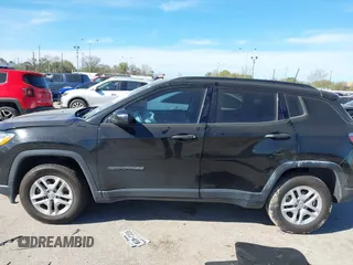 2018 Jeep Compass Sport with VIN 3C4NJCABXJT214907, listed as a IAAI auction lot 41814215 with 96,111 mi miles and . Bid and sale history available at DreamBid. Image 14.