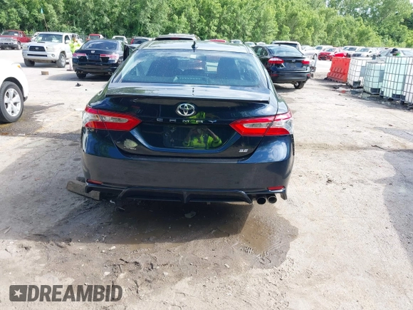 2018 Toyota Camry LE with VIN 4T1B11HK2JU579550, listed as a IAAI auction lot 42309663 with 40,868 mi miles and . Bid and sale history available at DreamBid. Image 16.
