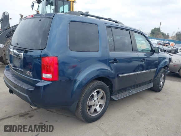 2009 Honda Pilot Touring with VIN 5FNYF48929B040199, listed as a IAAI auction lot 41466006 with 167,959 mi miles and . Bid and sale history available at carsss.com. Image 4.