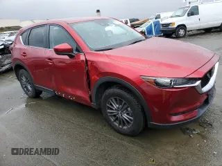 2021 Mazda CX-5 Touring with VIN JM3KFACM8M0406987, listed as a Copart auction lot 45241535 with 57,673 mi miles and Salvage Title. Bid and sale history available at carsss.com. Image 4.
