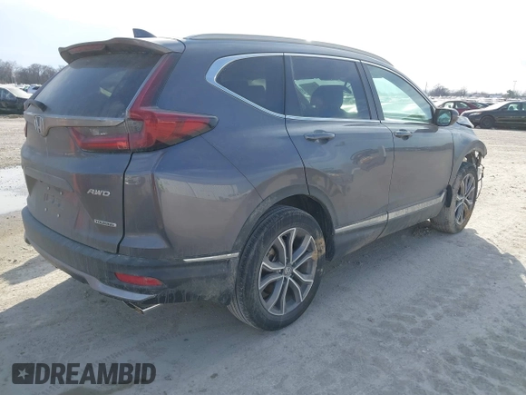 2020 Honda CR-V Touring with VIN 2HKRW2H91LH605995, listed as a IAAI auction lot 41672787 with 50,151 mi miles and . Bid and sale history available at DreamBid. Image 4.