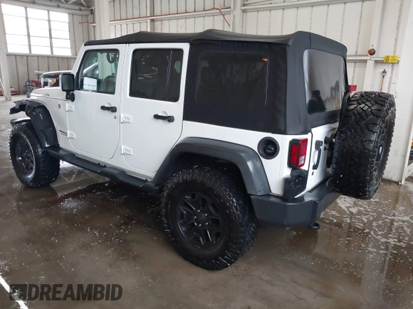 2016 Jeep Wrangler Unlimited Rubicon with VIN 1C4HJWFG4GL127379, listed as a IAAI auction lot 41732688 with 110,193 mi miles. Bid and sale history available at carsss.com. Image 3.
