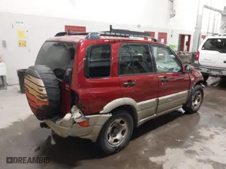 2002 Suzuki Grand Vitara JLX with VIN JS3TD62VX24155102, listed as a IAAI auction lot 41603245 with 152,657 mi miles. Bid and sale history available at carsss.com. Image 4.
