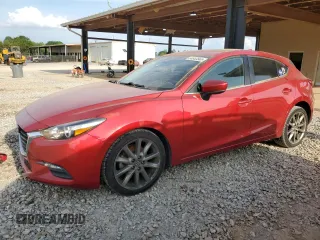 2018 Mazda 3 Touring z VIN 3MZBN1L39JM255859, wystawiony jako Copart lot #54883565 z przebiegiem 97 258 mil mil oraz Szkody całkowita. Historia ofert i sprzedaży dostępna na DreamBid. Obrazek 1.