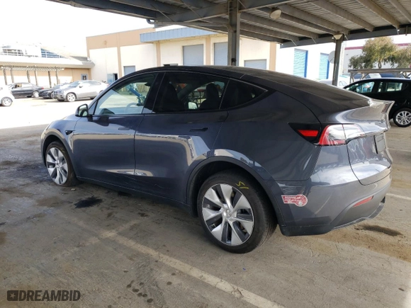 2023 Tesla Model Y Long Range with VIN 7SAYGDEEXPA137582, listed as a Copart auction lot 46869265 with 16,474 mi miles and Salvage Title. Bid and sale history available at carsss.com. Image 2.
