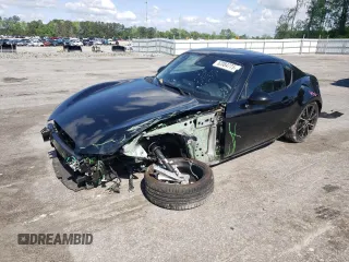 2024 Mazda MX-5 Miata Grand Touring z VIN JM1NDAM76R0603314, wystawiony jako Copart lot #52084775 z przebiegiem 6 537 mil mil oraz Szkoda całkowita • Salvage title. Historia ofert i sprzedaży dostępna na DreamBid. Obrazek 1.