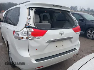 2011 Toyota Sienna XLE with VIN 5TDDK3DC8BS010051, listed as a IAAI auction lot 41405424 with 293,348 mi miles. Bid and sale history available at carsss.com. Image 6.