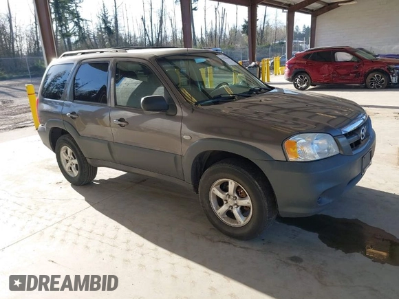 2006 Mazda Tribute i with VIN 4F2YZ02Z26KM12180, listed as a IAAI auction lot 41959606 with 228,217 mi miles and . Bid and sale history available at DreamBid. Image 1.