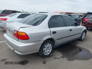 1999 Honda Civic LX with VIN JHMEJ6671XS003027, listed as a IAAI auction lot 41825146 with 197,764 mi miles and . Bid and sale history available at DreamBid. Image 4.