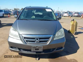 2007 Honda Odyssey EX-L z VIN 5FNRL386X7B405321, wystawiony jako IAAI lot #41703384 z przebiegiem 198 552 mil mil oraz . Historia ofert i sprzedaży dostępna na DreamBid. Obrazek 6.