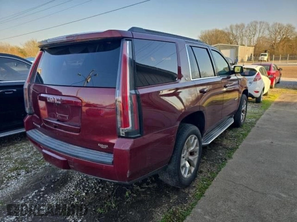 2016 GMC Yukon SLT with VIN 1GKS1BKC4GR346877, listed as a Copart auction lot 54334705 with 131,696 mi miles and Salvage Title. Bid and sale history available at carsss.com. Image 4.