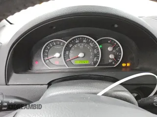2007 Kia Sorento LX z VIN KNDJD736075700860, wystawiony jako Copart lot #82119114 z przebiegiem 290 641 mil mil oraz Czysty tytuł • Clean title. Historia ofert i sprzedaży dostępna na DreamBid. Obrazek 9.