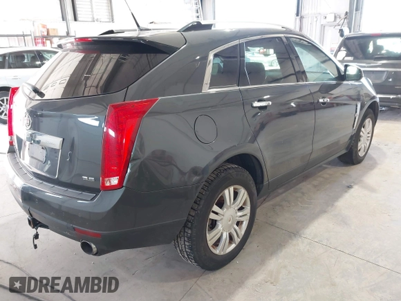 2012 Cadillac SRX Luxury Collection with VIN 3GYFNDE38CS654886, listed as a IAAI auction lot 41758399 with 210,680 mi miles. Bid and sale history available at carsss.com. Image 4.