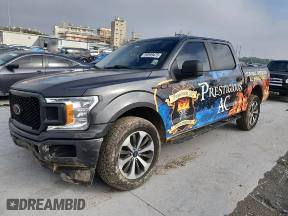2019 Ford F-150 XL with VIN 1FTEW1CP3KKD68005, listed as a Copart auction lot 50599475 with 129,200 mi miles and Salvage Title. Bid and sale history available at carsss.com. Image 1.