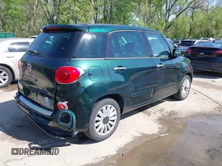 2014 FIAT 500L Easy with VIN ZFBCFABH4EZ022268, listed as a IAAI auction lot 42060203 with 106,918 mi miles. Bid and sale history available at carsss.com. Image 4.