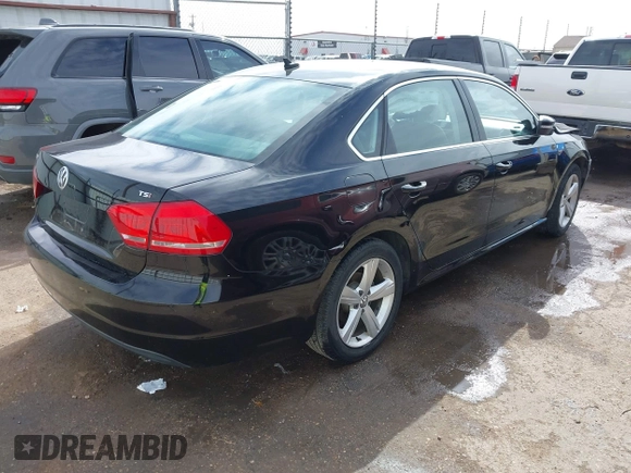 2015 Volkswagen Passat 1.8T Limited Edition with VIN 1VWAT7A31FC111352, listed as a IAAI auction lot 41575307 with 130,080 mi miles. Bid and sale history available at carsss.com. Image 4.