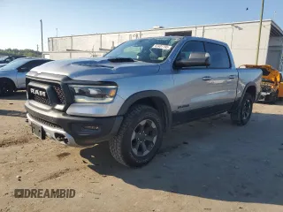 2019 Ram 1500 Rebel with VIN 1C6SRFLT4KN653192, listed as a Copart auction lot 63401795 with 83,354 mi miles and Salvage title. Bid and sale history available at DreamBid. Image 1.
