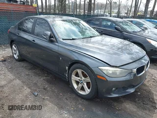 2013 BMW 3 Series 328i with VIN WBA3C1G50DNN93327, listed as a IAAI auction lot 41865009 with 175,371 mi miles. Bid and sale history available at carsss.com. Image 1.
