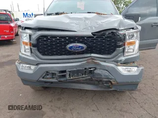 2021 Ford F-150 XL with VIN 1FTEW1EP0MFB94936, listed as a IAAI auction lot 41594393 with 57,033 mi miles. Bid and sale history available at carsss.com. Image 6.