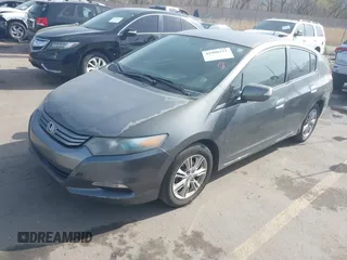 2010 Honda Insight EX with VIN JHMZE2H71AS032532, listed as a IAAI auction lot 41988221 with 333,144 mi miles and . Bid and sale history available at DreamBid. Image 17.