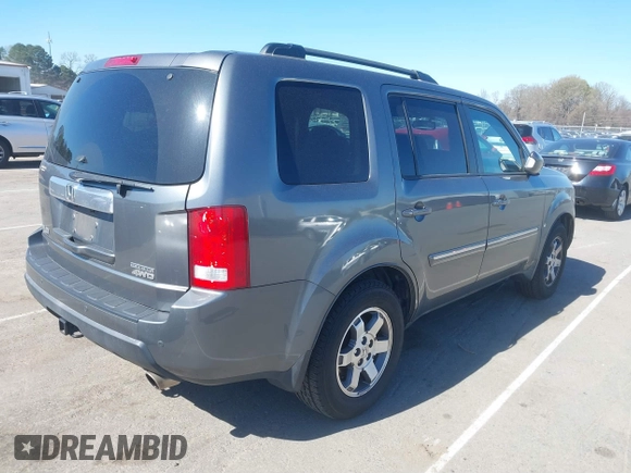 2010 Honda Pilot Touring with VIN 5FNYF4H94AB031167, listed as a IAAI auction lot 41800738 with 184,126 mi miles and . Bid and sale history available at carsss.com. Image 4.