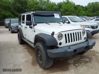 2013 Jeep Wrangler Unlimited Sport with VIN 1C4BJWDG8DL511315, listed as a IAAI auction lot 42004971 with 136,630 mi miles. Bid and sale history available at carsss.com. Image 1.