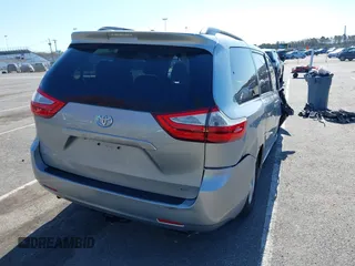 2015 Toyota Sienna LE AAS with VIN 5TDKK3DC0FS663826, listed as a IAAI auction lot 42050229 with 126,971 mi miles and . Bid and sale history available at DreamBid. Image 4.