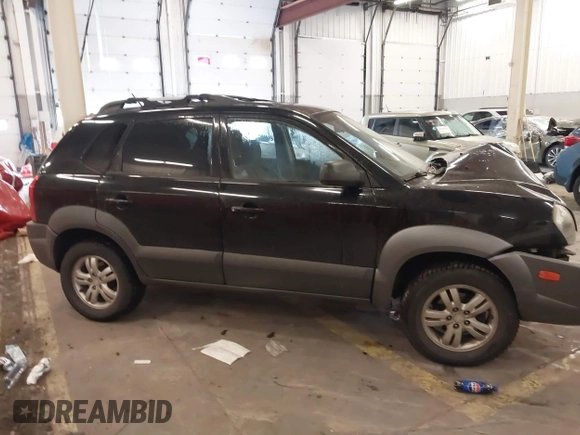 2007 Hyundai Tucson SE with VIN KM8JN72D47U670938, listed as a IAAI auction lot 41620857 with 129,769 mi miles and . Bid and sale history available at DreamBid. Image 14.