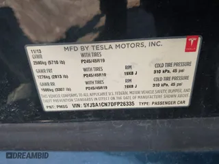 2013 Tesla Model S with VIN 5YJSA1CN7DFP26335, listed as a IAAI auction lot 41529752 with 247,789 mi miles. Bid and sale history available at carsss.com. Image 9.